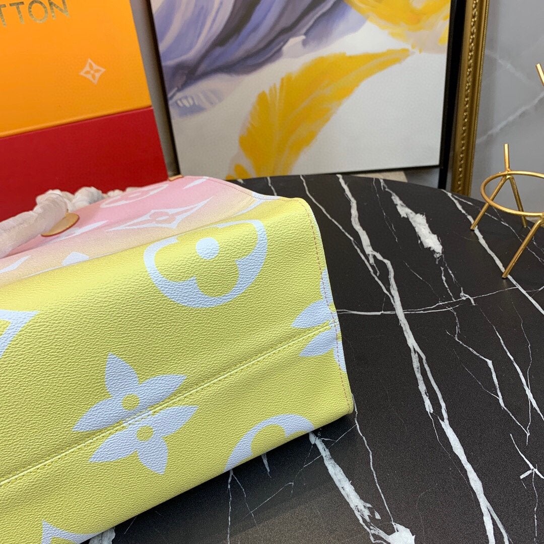 TOILE ENCOUÉE GÉANTE ONTHEGO GM 41 ROSE CLAIR MONOGRAMME