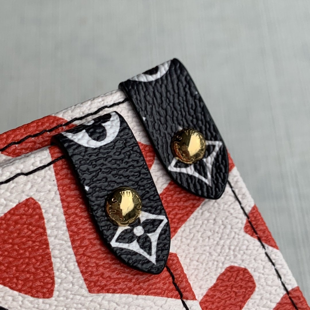 LV CRAFTY ONTHEGO GM CRÈME ET MONOGRAMME ROUGE TOILE GÉANTE