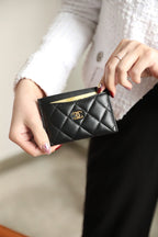 PORTE-CARTES CC 11 EN CUIR DE VEAU NOIR AVEC ICÔNE OR