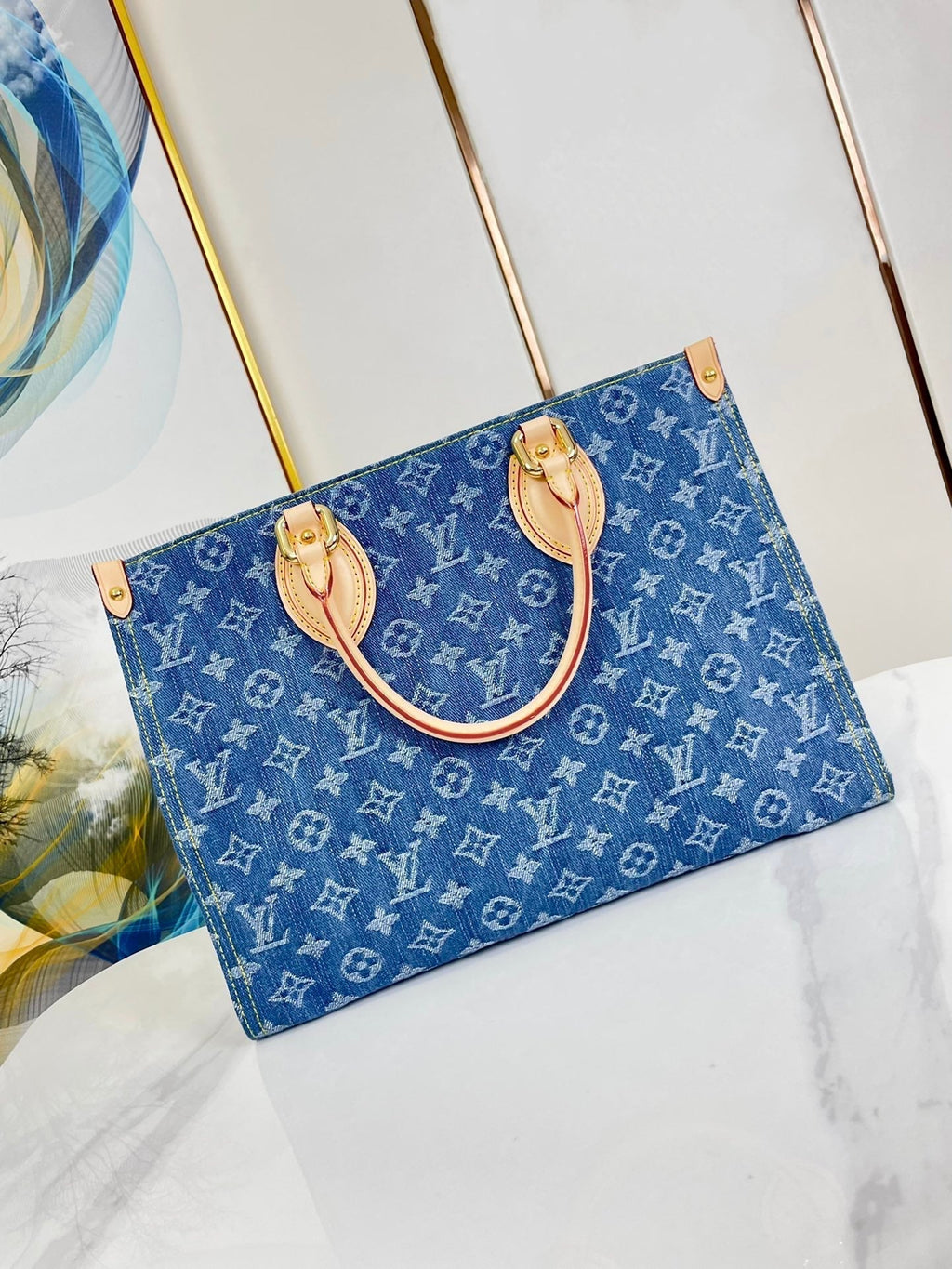 ONTHEGO 35 EN DENIM MONOGRAMME BLEU