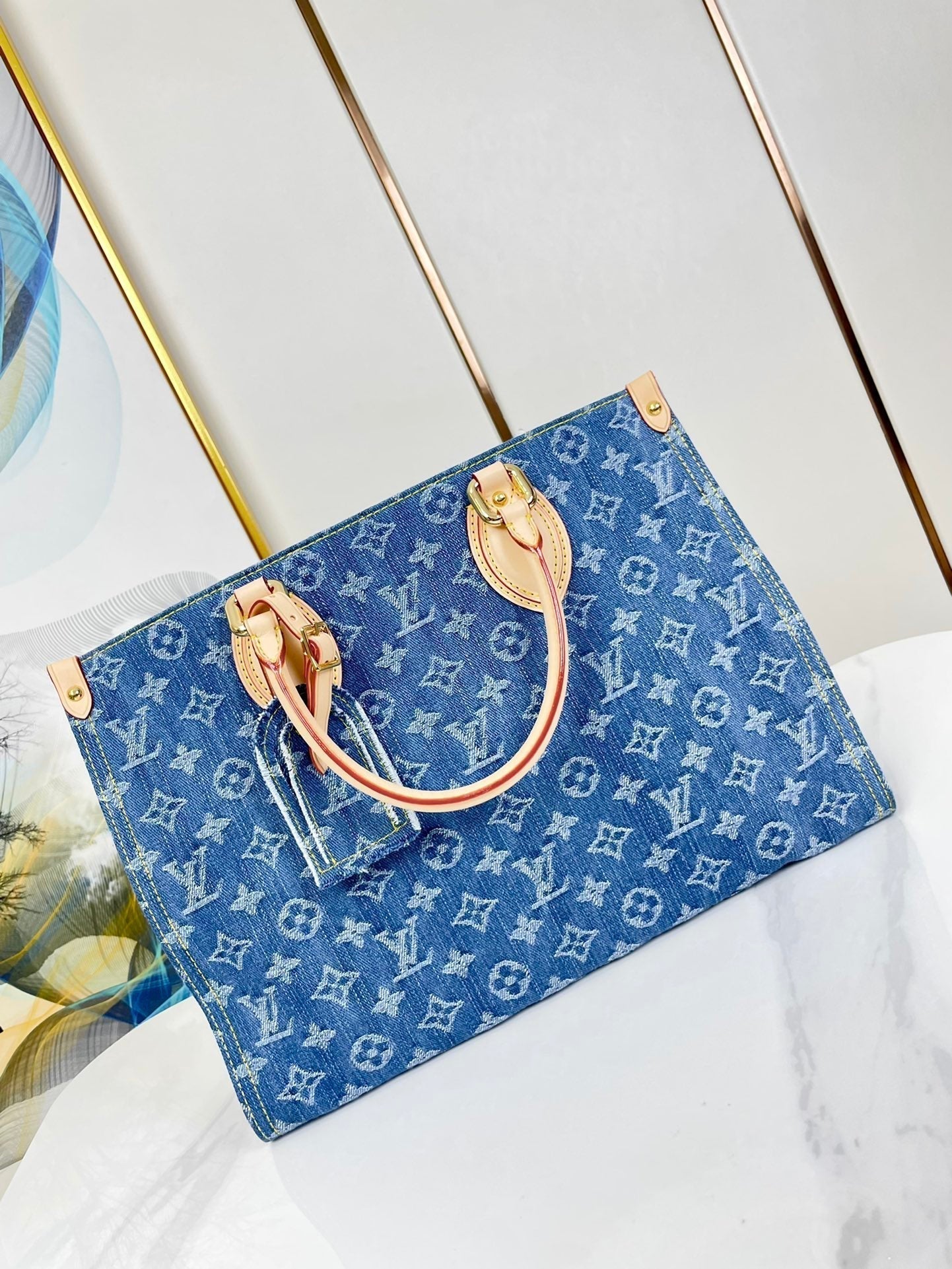 ONTHEGO 35 EN DENIM MONOGRAMME BLEU