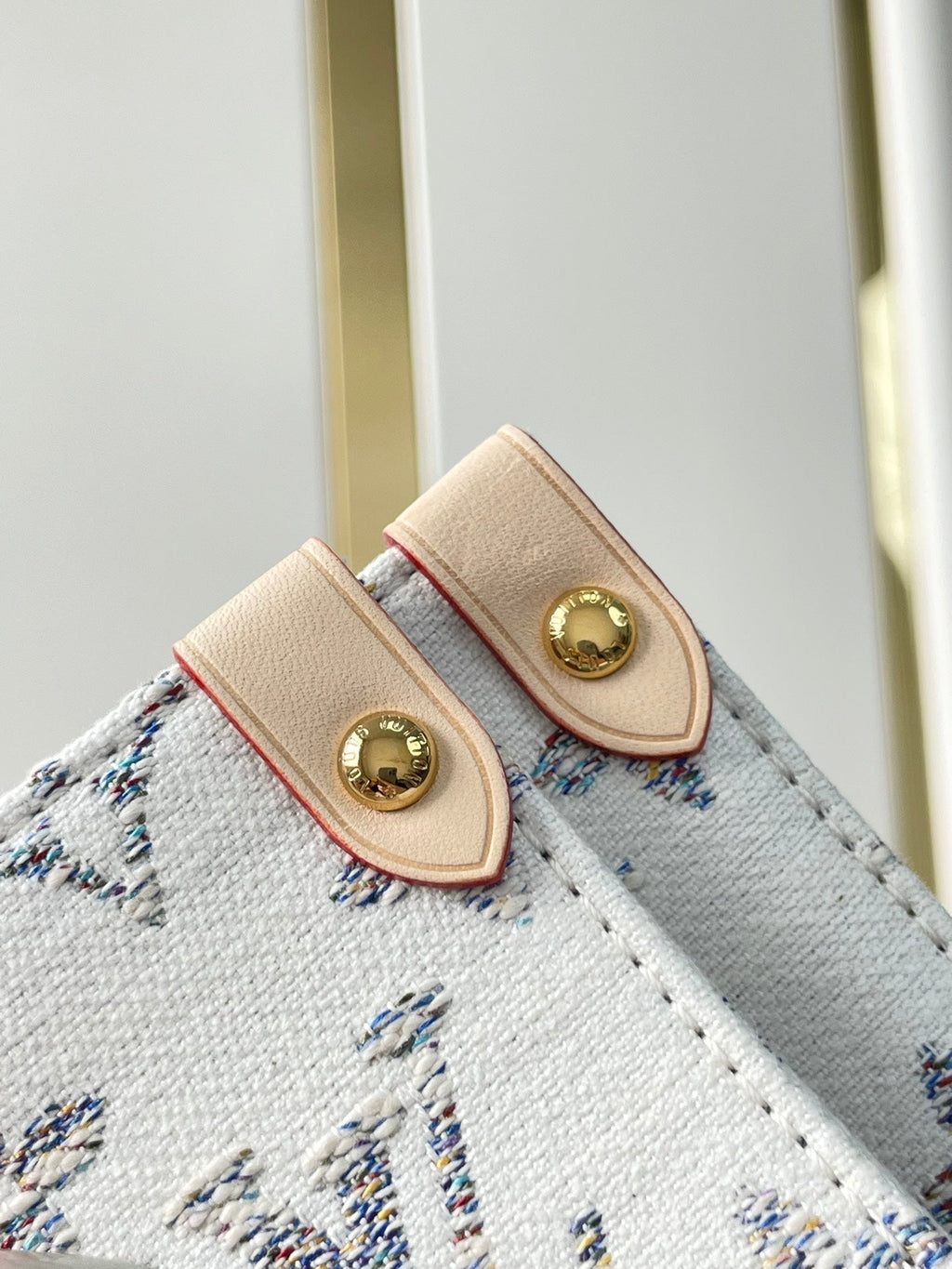 ONTHEGO MM 35 EN TISSU JACQUARD MONOGRAMME BLANC