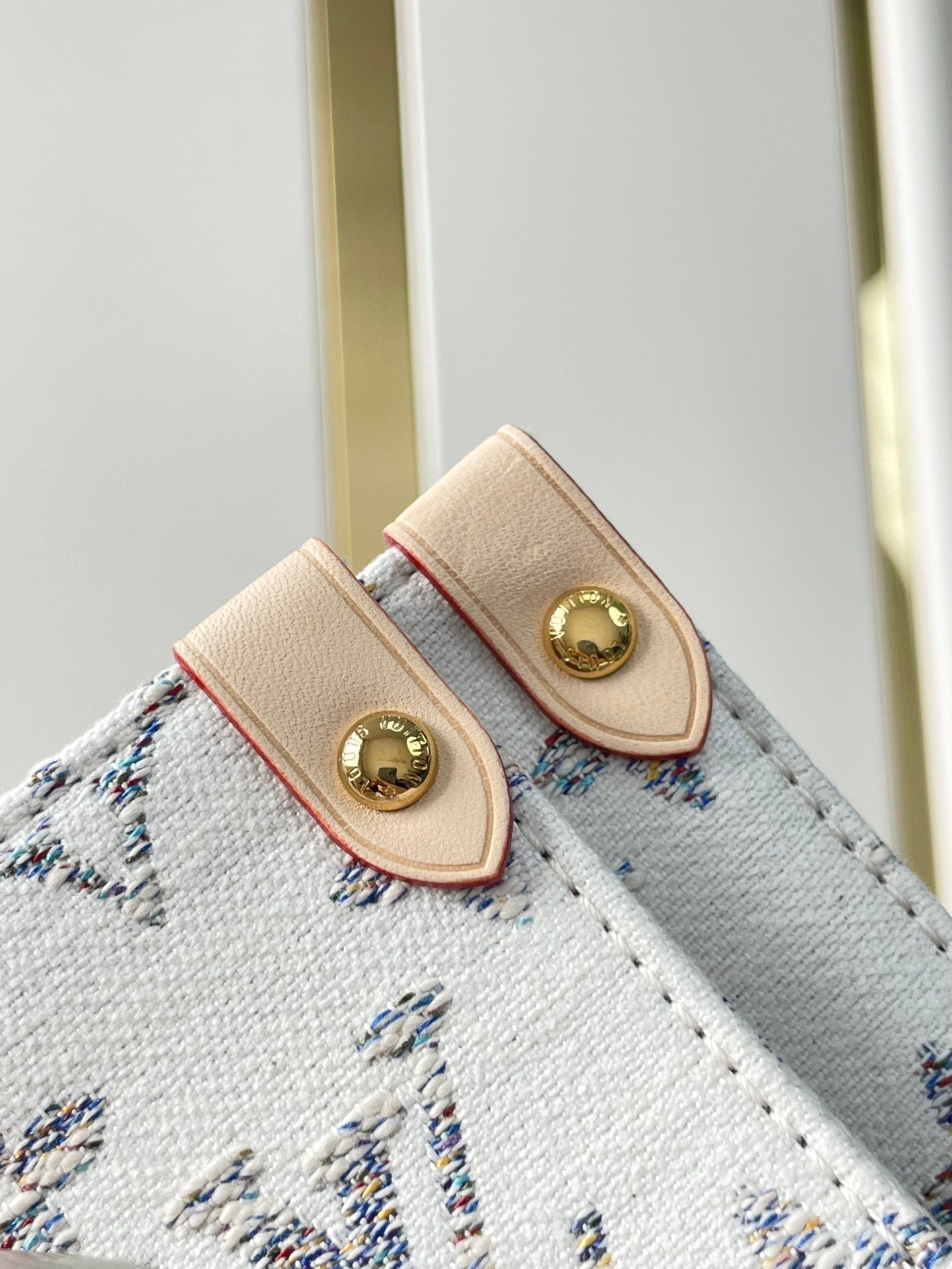 ONTHEGO MM 35 EN TISSU JACQUARD MONOGRAMME BLANC