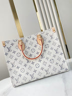 ONTHEGO MM 35 EN TISSU JACQUARD MONOGRAMME BLANC