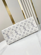ONTHEGO MM 35 EN TISSU JACQUARD MONOGRAMME BLANC