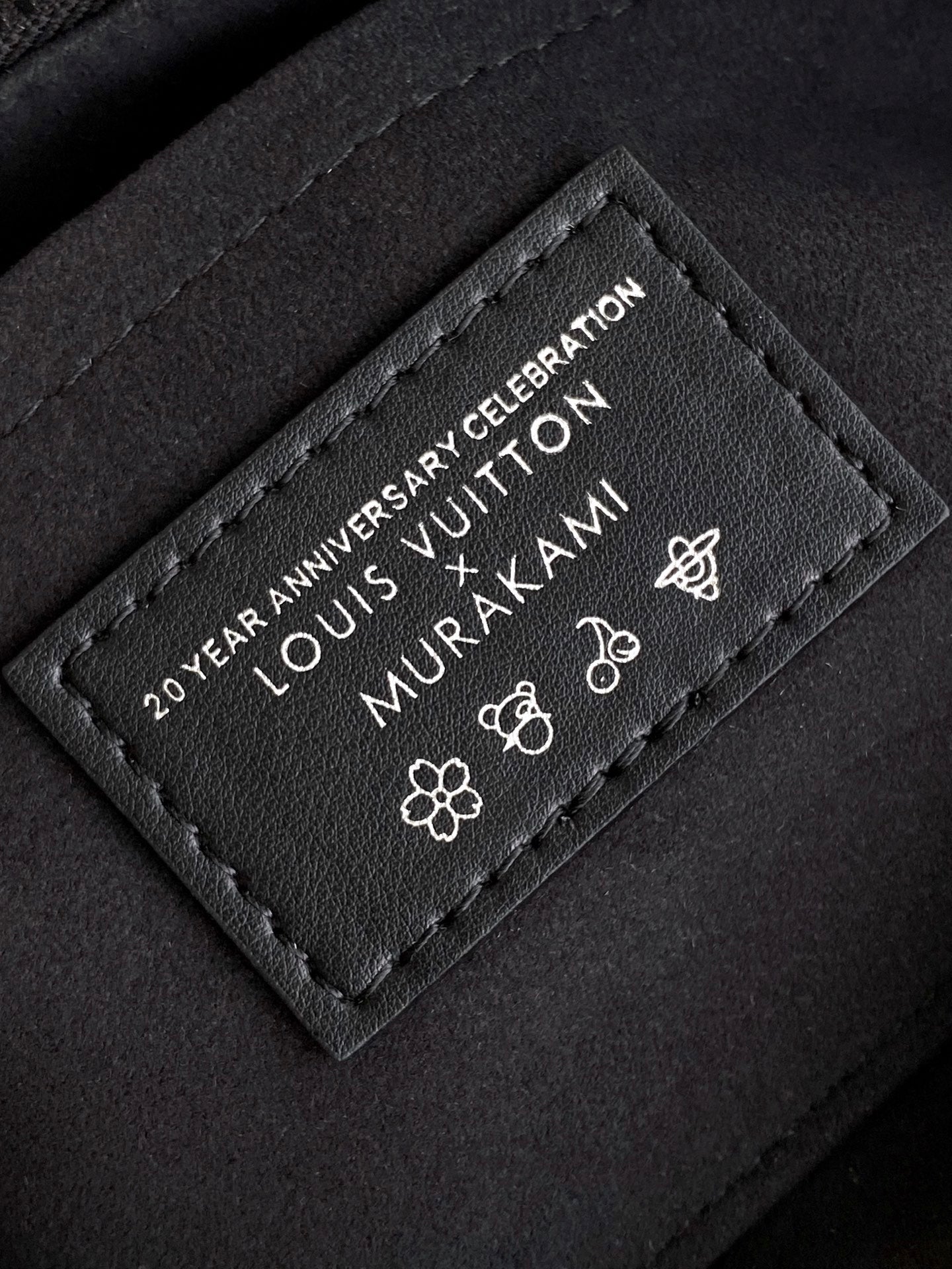 SAC ONTHEGO EST-OUEST 25 EN TOILE À MOTIFS MONOGRAMMES COLORÉS