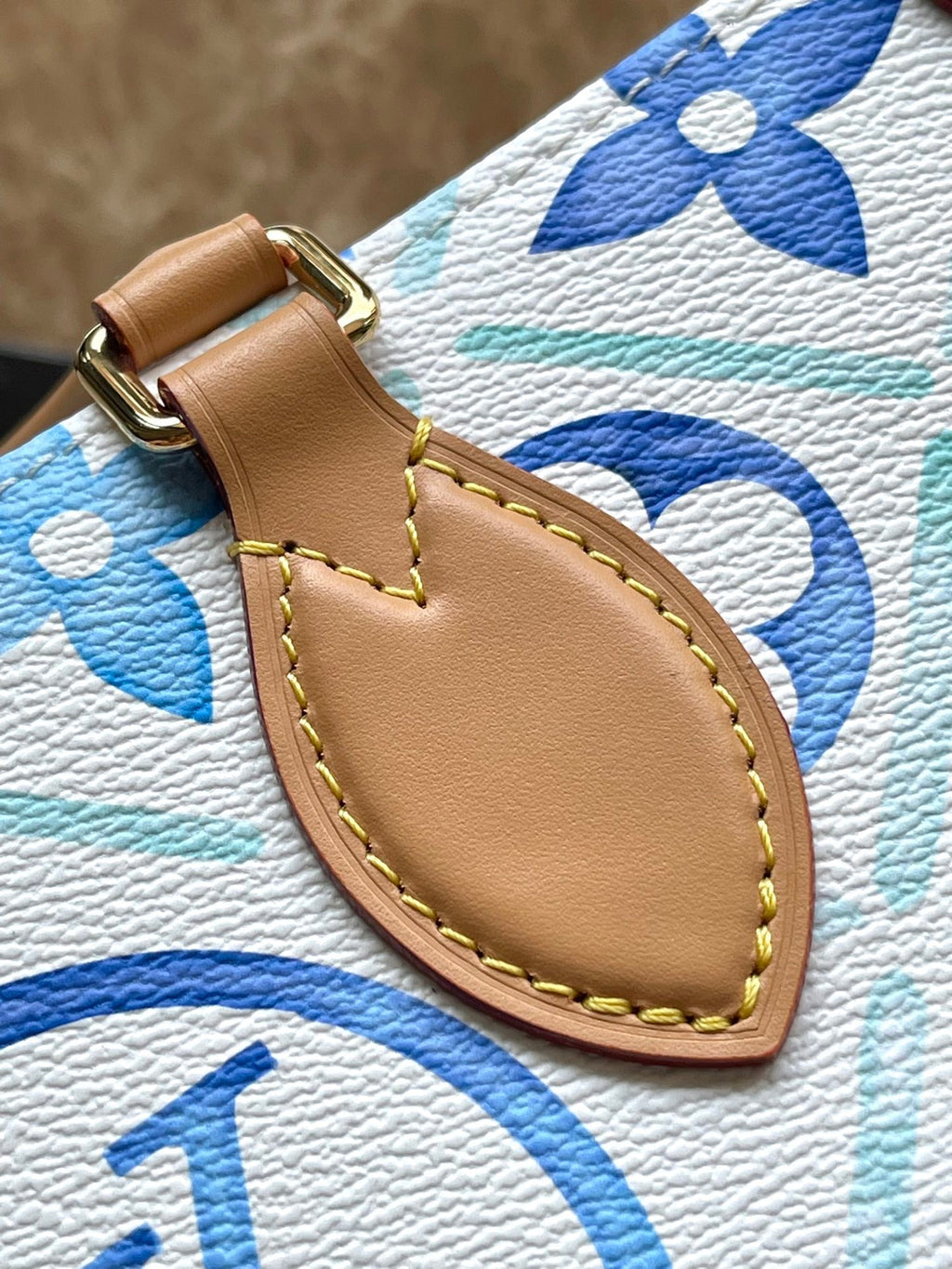 TOILE ONTHEGO EST OUEST 25 EN BLEU LAGON MONOGRAMME