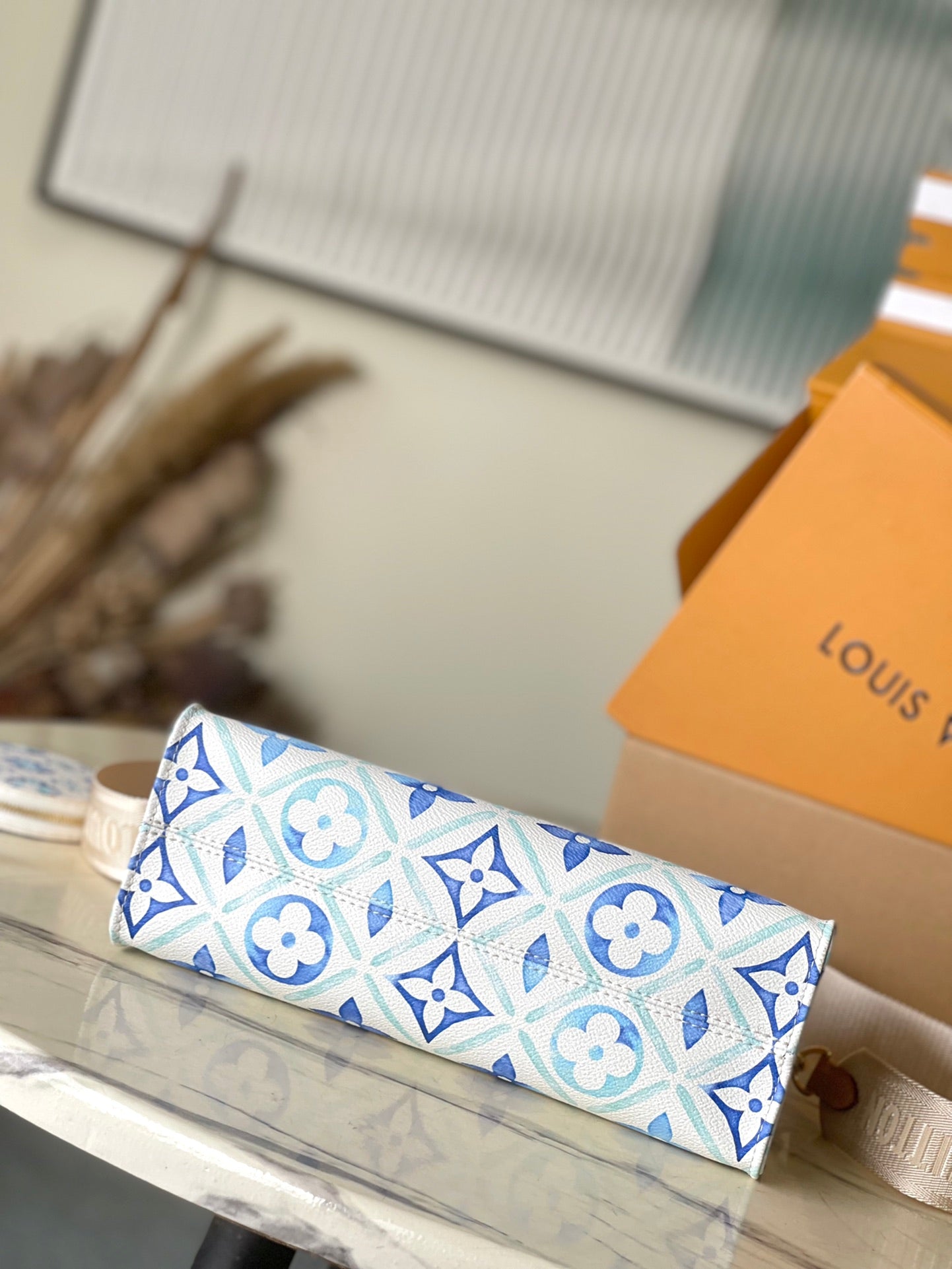 TOILE ONTHEGO EST OUEST 25 EN BLEU LAGON MONOGRAMME